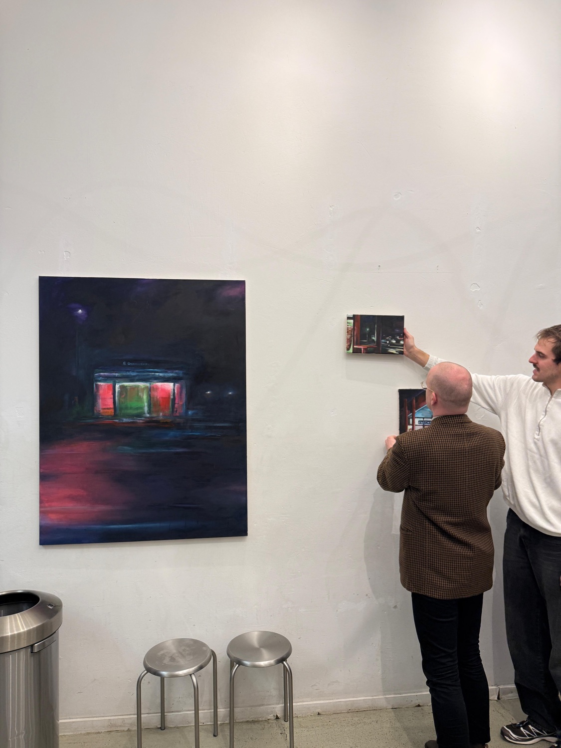 carry hanging works for an exhibition