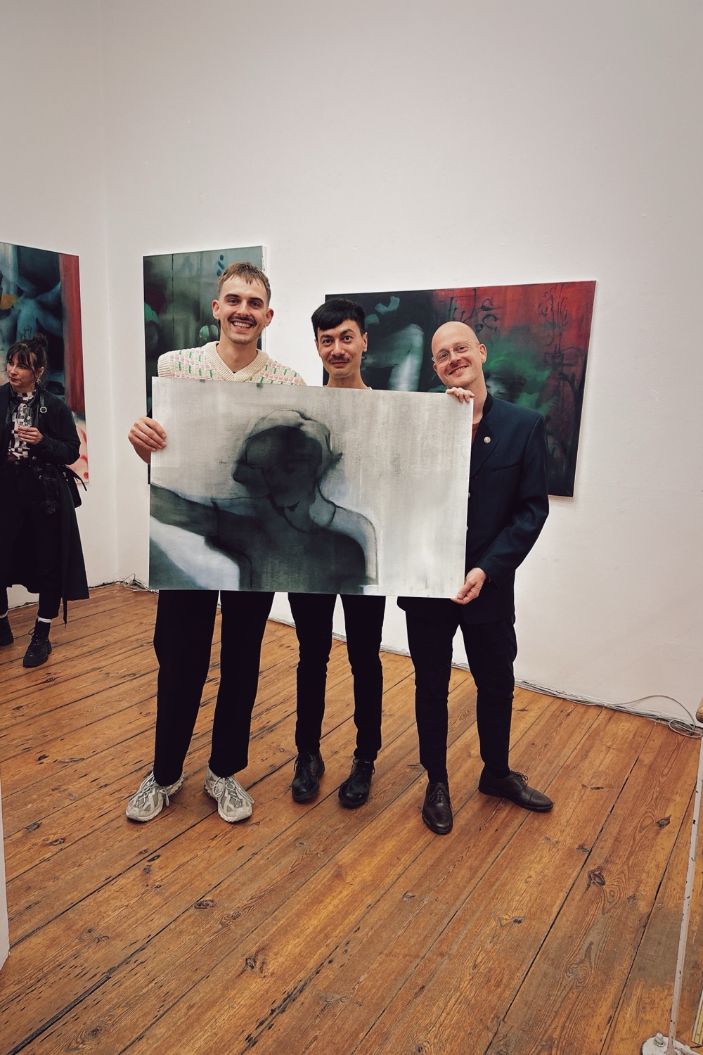 An artist with carry at an opening